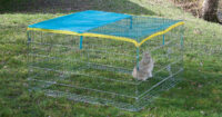 Open-air enclosure with breakout barrier